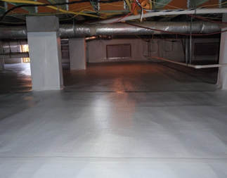 Dark encapsulated crawlspace with no standing water and visible plumbing in ceiling